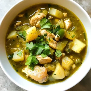- 1 lb chicken thighs, skinless and diced into bite-sized pieces - 4 cups rich chicken broth - 2 cups tomatillos, husked, rinsed, and roughly chopped - 1 cup green chiles (either fresh or canned), chopped - 1 medium onion, finely diced - 3 cloves of garlic, minced - 2 medium potatoes, peeled and cut into uniform cubes - 1 teaspoon ground cumin - 1 teaspoon dried oregano - 1 tablespoon extra virgin olive oil - Salt and freshly ground black pepper to taste - Fresh cilantro leaves, chopped, for garnish In this recipe, the chicken thighs serve as the heart of the stew. They add a rich flavor and tender texture. The chicken broth acts as the base, making the stew warm and comforting. Tomatillos and green chiles bring a fresh taste and a gentle heat. The tomatillos add a tangy note, while the chiles give that signature kick. Onion and garlic round out the flavor profile, providing depth and aroma. Potatoes not only add substance but also help absorb the flavors. Spices like cumin and oregano enhance the overall taste, making each bite a delight. For garnish, fresh cilantro adds brightness. It gives a colorful touch and balances the stew's heat. A sprinkle of salt and pepper at the end allows you to personalize the flavor. With these ingredients, you create a hearty and flavorful Green Chile Stew that is sure to please everyone at the table. {{ingredient_image_2}} 1. Sautéing onions and garlic: Start by heating 1 tablespoon of extra virgin olive oil in a large pot over medium heat. Once the oil shines, add 1 finely diced medium onion. Sauté it for about 5 minutes until it becomes soft and clear. This step builds a tasty base for our stew. Then add 3 minced cloves of garlic. Cook for another minute until the garlic smells good. 2. Cooking chicken to perfection: Now, add 1 pound of diced skinless chicken thighs to the pot. Season the chicken with salt, black pepper, 1 teaspoon of ground cumin, and 1 teaspoon of dried oregano. Cook for 5-7 minutes, stirring often. You want the chicken to brown nicely on all sides. This adds depth to the flavor. 3. Combining ingredients for the stew: Carefully pour in 4 cups of rich chicken broth. Next, add 2 cups of chopped tomatillos, 1 cup of chopped green chiles, and 2 peeled and cubed medium potatoes. Stir everything well to mix the flavors. 1. Boiling and reducing heat: Increase the heat to bring the pot to a gentle boil. Once you see bubbles rising, reduce the heat to low. This will let the stew simmer slowly. 2. Cooking time details: Let the stew cook uncovered for about 30-35 minutes. Stir occasionally. You want the potatoes to become tender and the flavors to blend well. 1. How to present the stew: Once the stew is ready, ladle it into bowls. Serve it hot, as it tastes best fresh. 2. Garnishing tips: For a pop of color and flavor, sprinkle fresh chopped cilantro on top just before serving. This adds a nice touch to your dish. Enjoy your hearty green chile stew! To create a rich flavor, start by browning the chicken well. This adds depth to the stew. Use fresh ingredients whenever possible. Fresh tomatillos and green chiles give the best taste. For texture, cut potatoes into uniform cubes. This helps them cook evenly. Stir the stew often to prevent sticking. This keeps the flavors mixed well. You can use other proteins if chicken isn’t your choice. Turkey or pork works great too. Just adjust cooking times as needed. For vegetables, feel free to swap in what you like. Zucchini or carrots can add a nice twist. You can also play with spices. Add more cumin for a bolder taste or try smoked paprika for a smoky flavor. Pro Tips Freshness is Key: Use fresh tomatillos and green chiles for the best flavor. They add a vibrant taste and bright color to your stew. Customize Your Heat: Adjust the amount of green chiles based on your spice tolerance. You can use milder varieties for a gentler kick. Perfect Potatoes: Cut your potatoes into uniform cubes to ensure they cook evenly and become tender at the same time. Let It Simmer: Allow the stew to simmer uncovered to help concentrate the flavors. The longer it simmers, the better the taste! {{image_4}} To make a vegetarian version, you can replace the chicken with hearty vegetables. Some great options include: - 1 can of black beans or pinto beans for protein - 2 cups of zucchini, chopped - 1 cup of corn for sweetness - 1 cup of carrots, diced When cooking, use vegetable broth instead of chicken broth. You can sauté the veggies just like the chicken. Cook until they are soft, and then add the remaining ingredients. This method keeps the stew full of flavor while making it meat-free. Using an Instant Pot makes this stew quick and easy. To prepare, follow these steps: 1. Use the sauté function for onions and garlic. 2. Add chicken (or veggies) and spices, browning them for a few minutes. 3. Pour in the broth, tomatillos, green chiles, and potatoes. Set your Instant Pot to high pressure for 10 minutes. Once done, let the steam release naturally for 10 minutes. This method saves time and keeps all the flavors locked in. Green chile stew varies by region and culture. In New Mexico, you might find it spicier with fresh Hatch chiles. In Texas, they may add beans and extra meat, making it heartier. Unique local ingredients can change the dish too. For example, in some places, people use roasted chiles for a smoky flavor. In others, fresh herbs like cilantro or parsley may be added for freshness. Each version tells a story of its roots and brings a new flavor to the table. After you enjoy your green chile stew, store leftovers safely. Let the stew cool to room temperature first. Then, place it in an airtight container. This helps keep the stew fresh. I recommend using glass containers for best results. They don’t absorb odors and are safe for reheating. Make sure to label your container with the date. This way, you know when to eat it by. You can store the stew in the fridge for about 3 to 4 days. If you want to keep it longer, freezing is a great option. Freezing green chile stew is easy and keeps it tasty. First, let the stew cool completely. Then, pour it into a freezer-safe container. Leave some space at the top. This allows for expansion when it freezes. You can also use freezer bags, but make sure to squeeze out the air. Seal them tight. To thaw, place the container in the fridge overnight. This keeps the stew safe. If you need it fast, you can use the microwave. Just be sure to stir it often to heat evenly. When you're ready to eat, reheat the stew on the stove. Use low heat and stir occasionally. This helps maintain the flavors. If it seems thick, add a bit of broth or water. Enjoy your hearty dish again! How spicy is green chile stew? Green chile stew has a mild to medium spice level. The heat comes from the green chiles used. If you prefer less heat, choose milder chiles or use less. If you like it spicy, add more chiles or even some jalapeños. This stew can be adjusted to fit your taste. Can I make it in advance? Yes, you can make green chile stew in advance. It tastes even better the next day as flavors meld. Store it in an airtight container. Keep it in the fridge for up to three days. You can also freeze it for up to three months. Just thaw it in the fridge overnight before reheating. Calorie count per serving Each serving of green chile stew has about 350 calories. This can vary based on the chicken and broth you use. It's a hearty meal packed with nutrients, making it a great choice for lunch or dinner. Health benefits of green chile stew This stew is full of healthy ingredients. Chicken provides protein for muscle health. Potatoes add fiber for digestion. Tomatillos and green chiles are rich in vitamins and antioxidants. Eating this stew can boost your immune system and keep you strong. What goes well with green chile stew? Green chile stew pairs well with many sides. You can serve it with warm tortillas for dipping. Rice also complements it nicely, soaking up the stew's rich flavors. A simple side salad adds freshness to your meal. Recommended accompaniments Try topping your stew with shredded cheese or a dollop of sour cream. Fresh cilantro adds a nice touch as well. For a crunch, serve with tortilla chips on the side. These sides enhance the stew and make your meal more enjoyable. This blog post covered how to make a delicious green chile stew. We looked at the key ingredients, from chicken thighs to spices. You learned the step-by-step process, including how to sauté and simmer effectively. I shared tips for flavor, texture, and ingredient swaps. Plus, we explored variations like vegetarian options and Instant Pot shortcuts. In conclusion, this stew is simple yet satisfying. You can enjoy it in many ways. Happy cooking, and trust your taste buds!