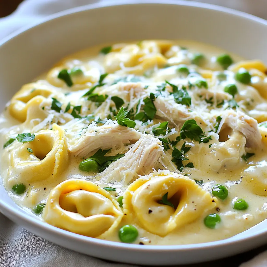 - 2 boneless, skinless chicken breasts - 3 cups chicken broth - 1 jar (15 oz) creamy Alfredo sauce - 1 cup heavy whipping cream - 1 package (9 oz) refrigerated cheese tortellini - 1 cup frozen peas - 1 teaspoon garlic powder - 1 teaspoon Italian seasoning - Salt and black pepper, to taste - Fresh parsley, finely chopped - Grated Parmesan cheese In this dish, the chicken provides a great base. I love using boneless, skinless chicken breasts. They cook well in the crockpot and stay juicy. The chicken broth adds flavor and helps cook the chicken. For creaminess, I use a jar of Alfredo sauce and heavy whipping cream. The combination makes a rich sauce that clings to the tortellini. The cheese tortellini adds a fun twist. It's quick to prepare and pairs well with the creamy sauce. Frozen peas add color and a pop of sweetness. They also give a nice texture contrast. For seasoning, garlic powder and Italian seasoning bring out great flavors. A pinch of salt and a few cracks of black pepper make it all come alive. To finish, I love to garnish with fresh parsley for brightness. A sprinkle of grated Parmesan cheese adds a nice touch of saltiness. These simple ingredients work together to create a comforting and delicious meal that feels special, yet is easy to make. {{ingredient_image_2}} To start, place the two boneless, skinless chicken breasts at the bottom of your crockpot. I like to season the chicken with garlic powder, Italian seasoning, salt, and black pepper. This adds great flavor. Pour the chicken broth over the seasoned chicken. Ensure the chicken is fully submerged for even cooking. Cover the crockpot and set it to cook on low for 5-6 hours or high for 3-4 hours. This makes the chicken tender and easy to shred. Once the chicken is cooked, carefully take it out of the crockpot. I use two forks to shred the chicken into bite-sized pieces. Then, return the shredded chicken to the pot. Now, pour in the rich Alfredo sauce and the heavy whipping cream. Stir gently until everything is mixed well. This creates a creamy base that makes the dish so delicious. Next, add the refrigerated cheese tortellini and frozen peas to the mix. This adds great texture and flavor. Make sure to mix everything together well so the tortellini is evenly distributed in the sauce. Cover the crockpot again and continue to cook on low for another 30-40 minutes. This will make the tortellini tender and heat everything through. Before serving, taste and adjust the flavors if needed. For the best results, set your crockpot to low. Cooking on low gives the chicken time to absorb flavors and stay juicy. To keep the chicken tender, make sure it is covered with broth. This helps it cook evenly and prevents it from drying out. Always taste your dish before serving. You can add salt or pepper to boost the flavor. If you want extra richness, mix in a bit more heavy cream or a splash of broth. This will make the sauce even creamier and more delightful. Serve your dish in deep bowls or stylish plates. This makes it look fancy and inviting. Drizzle some extra Alfredo sauce on top for added flair. Finish with a sprinkle of fresh parsley for color and freshness. This simple touch makes a big difference in how your meal looks. Pro Tips Cook Chicken Thoroughly: Ensure the chicken is cooked to an internal temperature of 165°F (75°C) for safety and tenderness. Use Quality Ingredients: The flavor of your Alfredo sauce will greatly depend on the quality of the sauce and cheese used; opt for a reputable brand for best results. Don’t Overcook Tortellini: Keep an eye on the tortellini as it cooks; overcooked pasta can become mushy. Aim for al dente for the best texture. Garnish for Presentation: A sprinkle of fresh parsley and Parmesan not only enhances the flavor but also makes the dish visually appealing. {{image_4}} You can swap chicken for turkey or tofu. Turkey has a lean taste that works well here. Tofu gives a nice plant-based option. Just prepare it the same way as chicken. Season it well for the best flavor. If you want to try something new, swap the Alfredo sauce for a different one. A creamy mushroom sauce or a marinara can change the whole dish. You can also add spices like cayenne or smoked paprika for depth. These flavors make your meal exciting and unique. Adding vegetables can boost nutrition and flavor. Try carrots, spinach, or broccoli for extra crunch. You can also use zucchini or bell peppers for a colorful twist. If you want a lighter meal, add more veggies and cut back on tortellini. This way, you keep it healthy and tasty. To keep your Crockpot Chicken Alfredo Tortellini fresh, store leftovers right away. Place the dish in an airtight container. Glass or plastic containers work well. Make sure to cool it down before sealing. This helps prevent moisture buildup. Store it in the fridge for up to four days. If you want to save some for later, freezing is a great option. Let the dish cool completely before freezing. Use freezer-safe containers or heavy-duty bags. Remove as much air as you can to prevent freezer burn. To thaw, move it to the fridge overnight. Reheat in a pot over low heat, stirring often, until warm. In the fridge, your Chicken Alfredo Tortellini lasts about four days. If frozen, it can stay good for up to three months. Just remember, the longer it stays frozen, the more it may lose taste and texture. To make this dish, follow these simple steps: - Place two boneless, skinless chicken breasts in the crockpot. - Season with garlic powder, Italian seasoning, salt, and pepper. - Pour three cups of chicken broth over the chicken. - Cook on low for 5-6 hours or high for 3-4 hours. - When done, shred the chicken with two forks. - Add a jar of Alfredo sauce and one cup of heavy cream. - Mix in a package of refrigerated cheese tortellini and one cup of frozen peas. - Cook on low for another 30-40 minutes, until the tortellini is tender. - Serve hot, topped with parsley and Parmesan cheese. Yes, you can use frozen tortellini. It cooks well in the crockpot. Here’s what to know: - Frozen tortellini saves time and works perfectly. - If using frozen, add it to the crockpot during the last 30-40 minutes of cooking. - Fresh tortellini is softer and cooks faster. - Both options taste great; choose what you prefer. Pair your dish with these tasty sides for a complete meal: - Garlic bread complements the creamy sauce. - A fresh salad adds crunch and balance. - Steamed broccoli or green beans bring color and nutrition. - Roasted vegetables offer a hearty touch. - Choose any side you love to make it special! This recipe for Crockpot Chicken Alfredo Tortellini combines simple ingredients for a tasty dish. You learned how to season chicken, prepare tortellini, and add flavor with tips and variations. Remember, you can switch proteins and sauces or add veggies to suit your taste. Store leftovers properly for later enjoyment. With this guide, you can make a delicious meal with ease. Enjoy the creamy goodness and happy cooking!