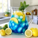 - 2 ripe peaches, pitted and sliced - 1 cup butterfly pea flower tea, brewed and cooled - 1/2 cup freshly squeezed lemon juice - 1/4 cup honey or agave syrup - 4 cups cold water - Ice cubes - Lemon slices for garnish - Fresh mint leaves for garnish Using fresh, ripe peaches makes a big difference. Look for peaches that are soft and fragrant. They should have vibrant colors, often with hints of red and yellow. Fresh lemons are key, too. Choose lemons that feel heavy for their size. This means they are juicy. For the butterfly pea flower tea, use high-quality dried flowers. They should be bright blue in color. If you can't find peaches, try using ripe nectarines or apricots. Both fruits work well in this drink. For the sweetener, maple syrup can replace honey or agave syrup. If you don't have butterfly pea flower tea, you can use hibiscus tea. It will give a lovely red color and a tart taste. To start, boil water in a pot. Measure 1 tablespoon of dried butterfly pea flowers per cup of water. Once the water boils, add the flowers and steep them for 5-7 minutes. This time allows the flowers to release their beautiful blue color. After steeping, strain the tea to remove the flowers. Let the tea cool completely before using it in the lemonade. Next, grab two ripe peaches. Remove their pits and slice them into smaller pieces. Place the slices into a blender. Add half of the freshly squeezed lemon juice to the blender. Blend on high speed until you achieve a smooth consistency. If you want an extra smooth drink, you can strain this puree to remove any pulp. Now, take a large pitcher and combine the peach puree with the remaining lemon juice. Add your choice of sweetener, either honey or agave syrup. Pour in the cooled butterfly pea flower tea and mix it all together well. Make sure the sweetener dissolves completely. Then, stir in 4 cups of cold water. Taste your lemonade and adjust the sweetness if needed by adding more sweetener. To make the perfect Butterfly Peach Lemonade, start with the sweetener. I suggest using honey or agave syrup. Add a quarter cup to the mix initially. Taste it! If it needs more sweetness, add more syrup. You can adjust it to what you like best. Remember, everyone’s taste is different. So, make it your own! Serve this drink cold for the best taste. Fill a glass with ice cubes first. Then pour the lemonade over the ice. This keeps it refreshing and chilled. You can also add lemon slices or mint leaves on top. They look great and boost the flavor. If you want a party twist, serve it in a fun pitcher. It makes a great centerpiece too! The colors in this drink are stunning! The blue from the tea and the yellow from the lemon juice swirl together. To make it pop, use clear glasses. This way, everyone can see the beautiful colors. You can also layer the lemonade for a fun look. Pour slowly to create layers. Garnish with fresh mint leaves and peach slices for extra flair. It will impress your friends and family! {{image_4}} You can change the sweetener in Butterfly Peach Lemonade. Honey brings a floral touch. Agave syrup works great if you want a lighter flavor. Maple syrup can add a unique twist. Try monk fruit or stevia for a no-calorie option. Adjust the amount to fit your taste. Each sweetener changes the drink slightly. Fruits can enhance the flavor of your lemonade. Add fresh strawberries for a sweet burst. Raspberries or blueberries also work well. You can muddle fruits at the bottom of the glass. This gives extra flavor and color. A splash of orange juice can brighten the drink. Experiment with different fruits to find your favorite mix. For a fun twist, add alcohol to the lemonade. Vodka is a great choice for its neutral taste. Mix in gin for a herbal note. You can also try rum for a tropical vibe. Start with one ounce per glass and adjust as needed. Garnish with fruit slices to make it look fancy. This gives your drink a summer party feel. To store leftover Butterfly Peach Lemonade, pour it into a clean jar or pitcher. Seal it tightly with a lid. Make sure to keep it in the fridge. This drink is best enjoyed cold. Butterfly Peach Lemonade lasts about 3 to 5 days in the fridge. After that time, the flavors may change. The lemonade might start to lose its freshness. Always check for any off smells or changes in color before drinking. You can freeze Butterfly Peach Lemonade if you want to save it longer. Pour the lemonade into ice cube trays or freezer-safe containers. Make sure to leave some space at the top, as liquids expand when they freeze. Frozen lemonade cubes are great for drinks later or to cool down other beverages. Just remember, it’s best to enjoy it fresh for the best taste! Butterfly pea flower tea has a mild, earthy flavor. It is not sweet or strong. The taste is light and refreshing. It pairs well with other flavors, like peach and lemon. When blended in this lemonade, it gives a unique twist. The color is stunning, turning bright blue when cold. Adding lemon juice changes it to purple. This makes it fun and pretty! Yes, you can make Butterfly Peach Lemonade ahead of time. Prepare it a few hours before serving. Just follow the recipe steps and mix all ingredients. Store it in the fridge to keep it cool. This drink tastes best when chilled. If you make it too early, the flavors may fade. Avoid adding ice until you are ready to serve. This keeps it from getting watery. Butterfly Peach Lemonade is a healthy option. It uses fresh peaches and lemon juice, both rich in vitamins. Peaches have vitamin C and fiber, which are good for digestion. Lemon juice adds more vitamin C and helps hydration. You can adjust sweetness by using honey or agave syrup. Using less sweetener makes it even healthier. Enjoy this drink guilt-free on hot summer days! This article shared all you need to know for making Butterfly Peach Lemonade. You learned about key ingredients, including how to choose quality items and find substitutes. I explained simple steps for brewing the tea and making peach puree. Tips for sweetness, serving, and visual appeal help you impress guests. We explored variations and how to store your lemonade. Enjoy this refreshing drink; make it your own!
