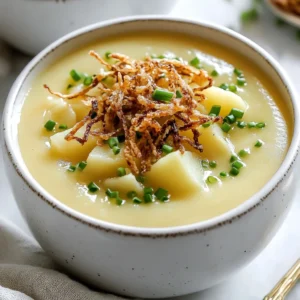 To make Old-Fashioned Potato Soup, you will need: - 4 large russet potatoes, peeled and diced into 1-inch cubes - 1 medium onion, finely chopped - 2 cloves garlic, minced - 4 cups of vegetable broth, preferably low-sodium - 1 cup whole milk or plant-based milk (like almond or oat milk) - 2 tablespoons butter or olive oil - 1 teaspoon dried thyme, or 2 teaspoons fresh thyme, finely chopped - Salt and pepper to taste - Fresh chives, finely chopped (for garnish) - Optional: crispy fried onions for topping You can easily make this soup plant-based. Use olive oil instead of butter. For the milk, choose almond, oat, or soy milk. These options keep the soup creamy while staying dairy-free. Vegetable broth is already plant-based. So, you&rsquo;re good to go! Choosing the right potatoes is key. Look for russet potatoes. They have a starchy texture, which makes the soup creamy. Check for any soft spots or dark spots; they should feel firm and smooth. Fresh potatoes give the best flavor. Avoid any that are green or sprouting. These may taste bitter and are not safe to eat. {{ingredient_image_2}} Start by peeling and dicing the potatoes into 1-inch cubes. Dice the onion and mince the garlic. In a large pot, melt the butter or heat the olive oil over medium heat. Add the onion and saut&eacute; for about 5 minutes. You want it soft and clear. Then, add the minced garlic and saut&eacute; for one more minute. Next, toss in the diced potatoes, vegetable broth, and thyme. Turn up the heat to high until it boils. Once boiling, reduce the heat to low and cover the pot. Let it simmer for 15-20 minutes. The potatoes should be soft and easy to pierce with a fork. After that, use an immersion blender to blend the soup. You can blend it smooth or leave some chunks if you like. Finally, stir in the milk and season with salt and pepper. Heat it for another 2-3 minutes but do not let it boil again. Once done, let it sit for a few minutes to deepen the flavors. Serve it hot, garnished with fresh chives and crispy onions if you want some crunch. I prefer using an immersion blender for potato soup. It&rsquo;s easier and less messy. You can blend right in the pot. This saves time and dishes. If you use a traditional blender, let the soup cool a bit. Blend it in batches and be careful because hot soup can splatter. Russet potatoes work best for this soup. They break down nicely and give a creamy texture. If you use waxy potatoes like red or new potatoes, adjust the cooking time. Waxy potatoes take longer to break down. Check them after 20 minutes. You want them soft but not mushy. To enhance your soup's taste, use herbs and spices wisely. The dried thyme adds a warm, earthy note. Fresh thyme boosts the flavor, making it brighter. You can also try adding a pinch of nutmeg. It gives a subtle warmth and pairs well with potatoes. Don&rsquo;t forget salt and pepper. Adjust them to your taste as you cook. Your soup's texture is key. If you like it smooth, blend all the soup. For a chunkier style, blend only half. This keeps some potato pieces in the mix. If it gets too thick, add a splash of milk or broth. If too thin, simmer it longer to reduce. Garnishing makes your soup look inviting. Fresh chives add a pop of color and a mild onion flavor. You can also sprinkle crispy fried onions on top. They add a nice crunch and extra taste. Serve the soup in warm bowls for a cozy feel. This simple touch elevates your dish and makes it even more heartwarming. Pro Tips Use Fresh Ingredients: Using fresh potatoes and herbs will significantly enhance the flavor of your soup. Adjust Consistency: If you prefer a creamier soup, blend more of the soup until smooth, or add more milk to achieve your desired texture. Flavor Boost: For a deeper flavor, consider adding a bay leaf during the simmering process and remove it before blending. Store Right: If you have leftovers, store them in an airtight container in the refrigerator for up to 3 days. Reheat gently on the stove. {{image_4}} You can make your potato soup more colorful and healthy. Add carrots, celery, or spinach. Chop them small so they cook well. Toss them in when you add the potatoes. This keeps the soup hearty and boosts the nutrients. For a protein kick, consider adding bacon or beans. Cook the bacon until crispy and crumble it on top. If you choose beans, add them during the last few minutes of cooking. Both options add flavor and make the soup satisfying. Switching up the broth can change your soup's taste. Use chicken broth for a richer flavor. You can also try bone broth for added richness. If you want a unique twist, use mushroom broth. This adds a nice umami flavor that pairs well with potatoes. To keep your potato soup fresh, store it in an airtight container. Let the soup cool down before sealing it. This helps prevent condensation and keeps the soup from getting watery. You can store it in the fridge for up to three days. When you want to eat it again, just pull it out! When reheating your soup, use a pot over low heat. Stir the soup often to heat it evenly. If the soup seems thick, add a splash of milk or broth to get the right consistency. You can also microwave it in a bowl. Just cover it loosely with a paper towel to avoid mess. Heat it for about one to two minutes, stirring halfway. If you want to save the soup for later, freezing is the way to go! Pour the cooled soup into freezer-safe bags or containers. Leave some space at the top, as the soup will expand when frozen. You can freeze it for up to three months. When you&rsquo;re ready to eat, thaw it overnight in the fridge. Then follow the reheating tips to enjoy your comforting dish again! To make Old-Fashioned Potato Soup vegan, swap dairy for plant-based options. Use almond or oat milk instead of whole milk. You can also replace butter with olive oil for saut&eacute;ing. This keeps the soup creamy and rich without animal products. Yes, you can use different types of potatoes. Russet potatoes give a creamy texture. Yukon Golds add a nice buttery flavor. Red potatoes hold their shape well and add color. Each type brings a unique taste, so feel free to mix them! Potato soup pairs well with many dishes. A fresh garden salad adds crunch. Crusty bread is perfect for dipping. Grilled cheese sandwiches make a great match too. For a light option, serve it with steamed veggies. Each choice complements the soup nicely. In this blog post, we explored how to make a delicious potato soup. We covered ingredient lists, substitutions for plant-based options, and tips for selecting the best potatoes. I shared step-by-step instructions, including cooking methods and adjusting times. We also discussed ways to enhance flavor and present your soup beautifully. Plus, I offered variations to suit various diets and storage tips to keep leftovers fresh. Now, you have the knowledge to create your perfect potato soup. Enjoy experimenting with flavors and ingredients to make it your own!