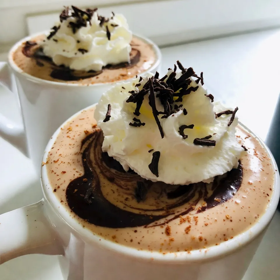 - 2 cups ready-made eggnog - 1 cup whole milk - 1/2 cup unsweetened cocoa powder - 2 tablespoons pure maple syrup - 1 teaspoon vanilla extract - 1/4 teaspoon freshly grated nutmeg - 1/4 teaspoon ground cinnamon - Whipped cream, for generous topping - Chocolate shavings, for garnish You can easily swap some ingredients for different needs. Here are a few ideas: - Dairy-free alternatives: Use almond milk or coconut milk instead of whole milk. This keeps the drink creamy but dairy-free. - Sweeteners options: If you prefer, replace pure maple syrup with honey or agave syrup. Both add a nice touch of sweetness. - Non-alcoholic variations: For a festive drink without alcohol, skip any spirits. You can still enjoy all the rich flavors of eggnog. This recipe allows for flexibility, so feel free to make it your own! {{ingredient_image_2}} To make the perfect Eggnog Brandy Alexander, start by heating the eggnog mixture. In a medium-sized saucepan, combine 2 cups of ready-made eggnog and 1 cup of whole milk. Place the saucepan over medium heat. Stir often to keep the mixture from burning. Next, incorporate the cocoa powder smoothly. Carefully sift in 1/2 cup of unsweetened cocoa powder. Whisk continuously until it blends well. This step ensures a rich and creamy texture without lumps. Now, let's add flavor enhancers. Stir in 2 tablespoons of pure maple syrup, 1 teaspoon of vanilla extract, 1/4 teaspoon of freshly grated nutmeg, and 1/4 teaspoon of ground cinnamon. Mix well to combine all the flavors. Achieving the right temperature is key. Continue to heat the mixture, stirring occasionally. You want it warm but not boiling, about 5 to 7 minutes. Look for steam rising to know it’s ready. Pouring into mugs comes next. After heating, remove the saucepan from the stove. Let it cool for a couple of minutes. Gently pour the warm mixture into individual mugs or festive cups. Now for the fun part: topping and garnishing techniques. Add a generous dollop of whipped cream on each mug. This creates a fluffy cloud. Finish off by sprinkling chocolate shavings on top. This elegant touch makes your Eggnog Brandy Alexander a feast for the eyes. To make the best Eggnog Brandy Alexander, focus on flavor balance. The rich eggnog and cocoa create a creamy base. Maple syrup adds sweetness. Nutmeg and cinnamon give warmth. Taste as you mix to find what works for you. For a smooth texture, whisk the cocoa powder carefully. Sifting it first helps avoid lumps. Stir the mixture gently as it heats. This keeps it creamy without burning. Use a good whisk for best results. For serving, use festive mugs or cups. A clear glass highlights the beautiful layers of your drink. Arrange them on a tray with holiday decorations. Add a cinnamon stick or a sprinkle of nutmeg for flair. Create a festive atmosphere with music and lights. Use soft lighting for warmth. Consider a holiday-themed table setup. This makes your guests feel special and welcome. Pro Tips Use Fresh Nutmeg: Freshly grated nutmeg significantly enhances the flavor profile of your eggnog delight. Consider investing in a small nutmeg grater for the best results. Chill Your Mugs: For an extra refreshing experience, chill your mugs in the freezer for about 10 minutes before serving. This will keep your eggnog delight colder for longer. Experiment with Spices: Feel free to enhance the flavor by adding other spices like cardamom or cloves. They can add an exciting twist to your festive drink. Whipped Cream Variations: Try flavored whipped cream, such as peppermint or vanilla, for an interesting and delicious variation on the classic topping. {{image_4}} You can make this drink both with and without alcohol. For the alcoholic version, use a splash of brandy. This adds a warm flavor that pairs well with eggnog. You can also try rum or whiskey for a unique twist. If you want a family-friendly drink, skip the alcohol completely. Use the same ingredients but keep it fun and festive. Kids will love the chocolatey taste. They won’t miss the spirits at all! Add extra spices to make it more special. Consider using ground ginger or cloves. These spices bring warmth and depth to the drink. You can also sprinkle some extra nutmeg on top for a fragrant finish. Another fun idea is to use flavored liquors. Try adding a splash of hazelnut or peppermint liqueur. This gives a new twist to the classic taste. It’s a great way to surprise your guests! To keep your Eggnog Brandy Alexander fresh, store it in the fridge. Use an airtight container. This keeps out air and odors. You should drink it within 3 to 5 days. Always check for any off smells before serving. Best practices for short-term use include stirring well before serving. This helps mix any settled ingredients. If you notice a change in texture, it’s best to toss it out. If you want to save your eggnog mixture longer, freezing is a great choice. Use a freezer-safe container. Leave some space at the top for expansion. You can freeze it for up to 3 months. To maintain quality over time, thaw it in the fridge overnight. When ready to serve, stir well to get the right consistency. If needed, add a splash of milk or cream to revive it. This keeps your drink creamy and delicious! Can I use homemade eggnog? Yes, you can use homemade eggnog. It adds a personal touch to your drink. Just make sure it’s thick and creamy for the best taste. How long can eggnog be stored? Eggnog can last in the fridge for about 3 to 5 days. Always check for freshness before using it. Can I make this recipe in advance? Yes, you can make it ahead of time. Store it in the fridge, and just heat it up before serving. What is the origin of the Eggnog Brandy Alexander? The Eggnog Brandy Alexander combines the classic Brandy Alexander drink with eggnog. It gained popularity in the United States in the 20th century. Can I omit the alcohol? Absolutely! You can skip the brandy and still enjoy a tasty drink. Just keep the other flavors. What are good food pairings with this cocktail? This drink pairs well with cookies, pies, and rich desserts. Try it with gingerbread or chocolate treats for a festive touch. This blog post covers how to make a delicious Eggnog Brandy Alexander. We discussed key ingredients like eggnog, cocoa powder, and spices. I shared steps for heating, mixing, and serving your drink perfectly. We also explored ingredient swaps and variations for all tastes. Remember, whether you choose non-alcoholic or try new flavors, you can personalize this recipe. Enjoy your festive drink, and impress your guests with your skills!